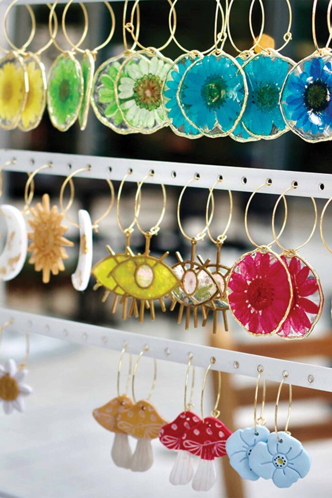 a row of earrings with different colors