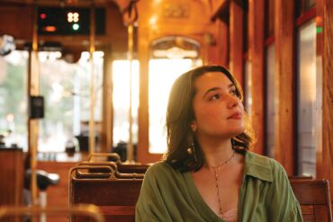 a person sitting in a train