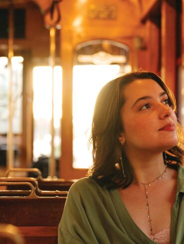 a person sitting in a train